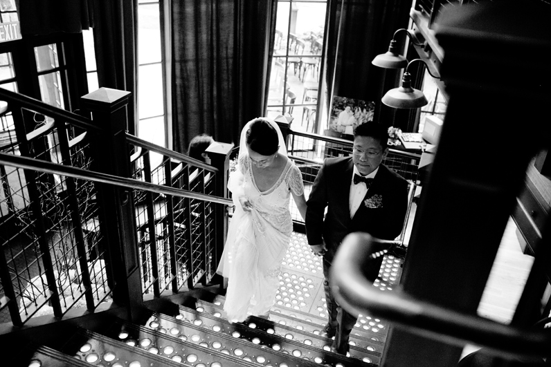 classic bride and groom enter reception
