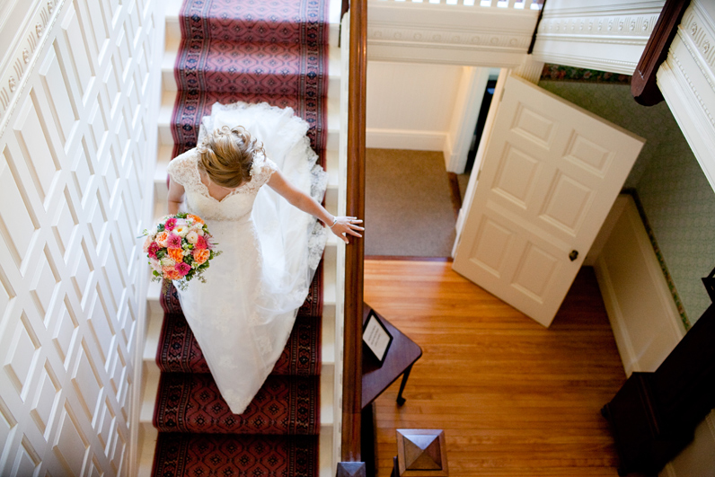 bride coming down the stairs at lyman estate wedding