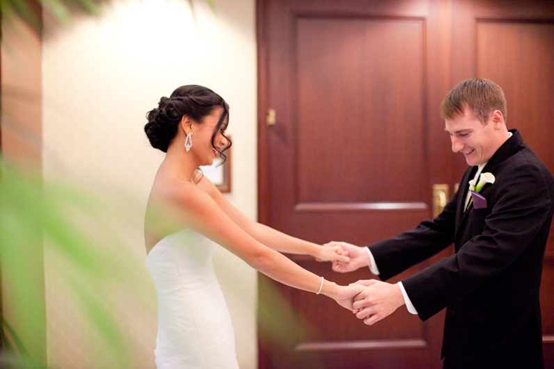 happy first look - bride and groom at the colonnade hotel