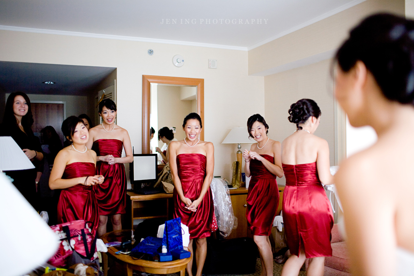 Boston wedding photography - bridesmaids smiling at bride