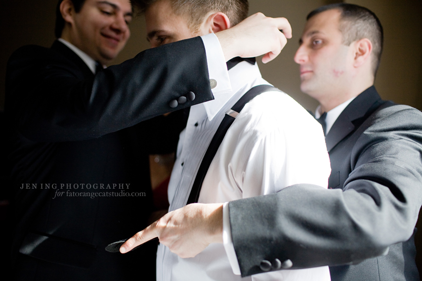 Cambridge wedding photography - dressing the groom