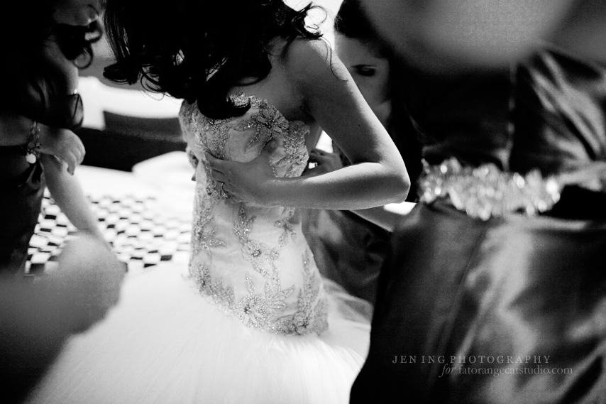 Armenian wedding photography - bride getting into dress