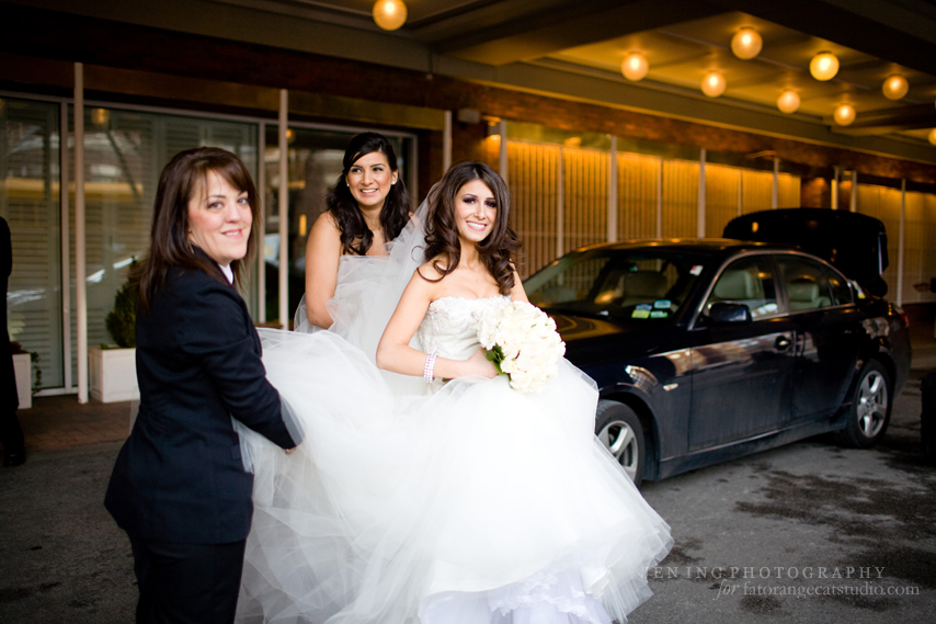 Charles Hotel Wedding photography - bride getting into limo