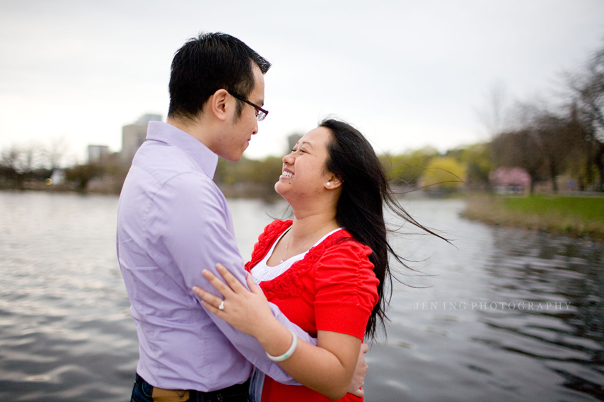 Engagement session on the Charles River - Couple on dock