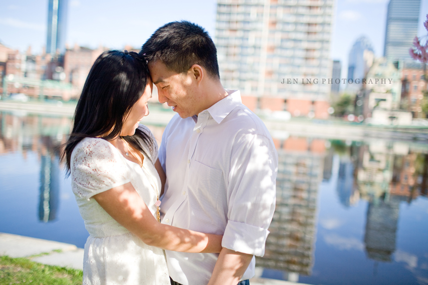Esplanade engagement session in Boston, MA - couple in front of city