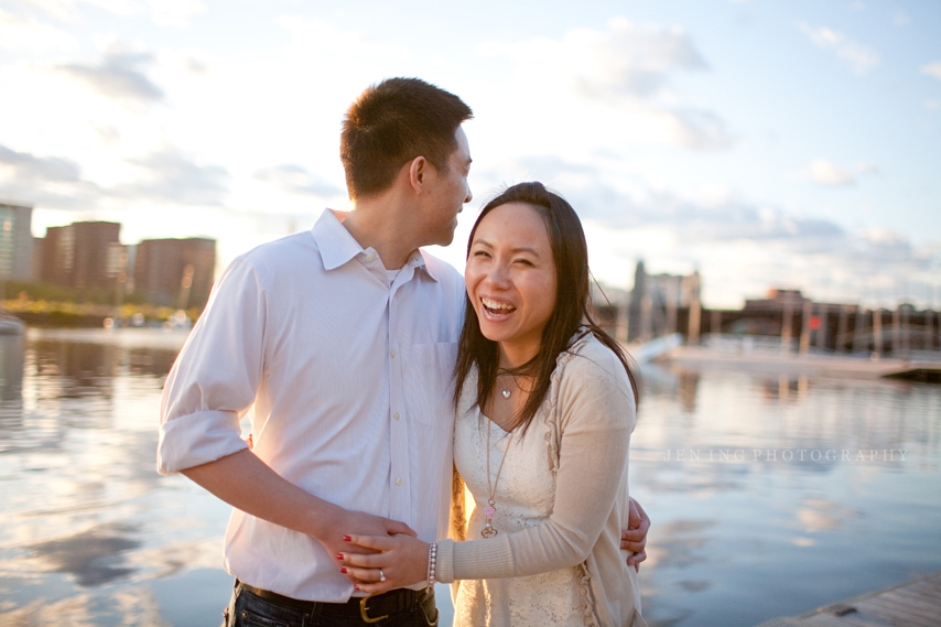 Esplanade engagement session in Boston, MA - girl laughing on dock