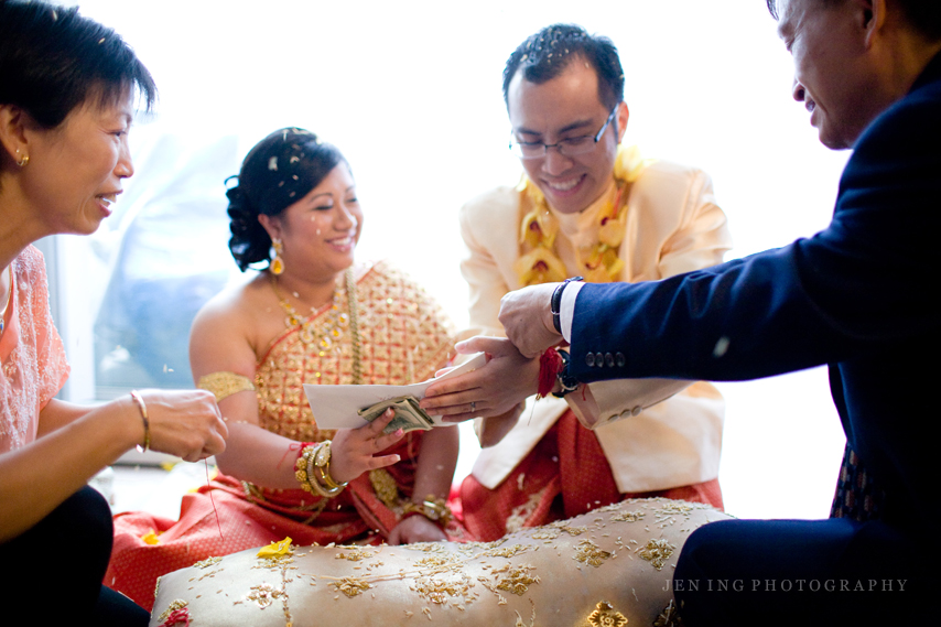 Cambodian wedding ceremony in Boston - tying strings