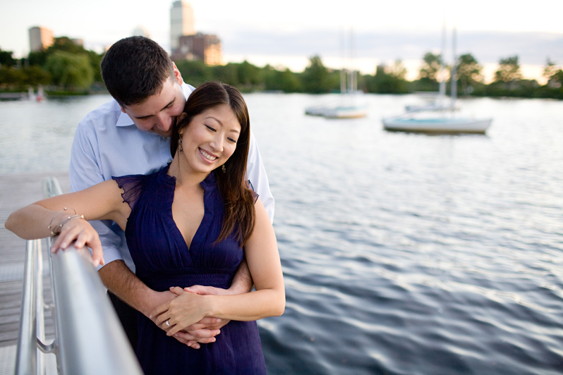 Charles River engagement photography - couple with boats