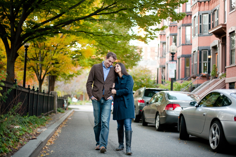 south end boston engagement session - couple walking down street
