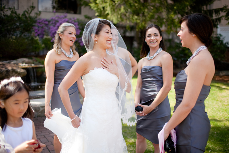 wedding at andover country club - bride laughing with bridesmaids