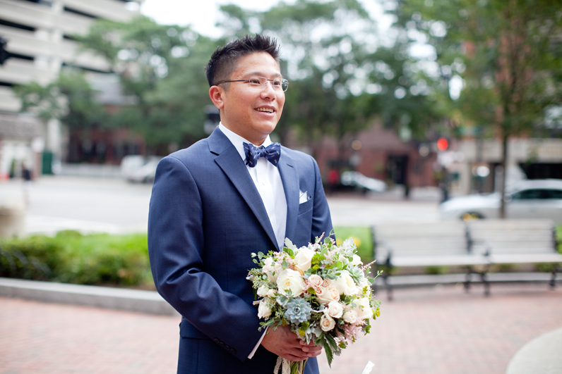 groom with bridal bouquet