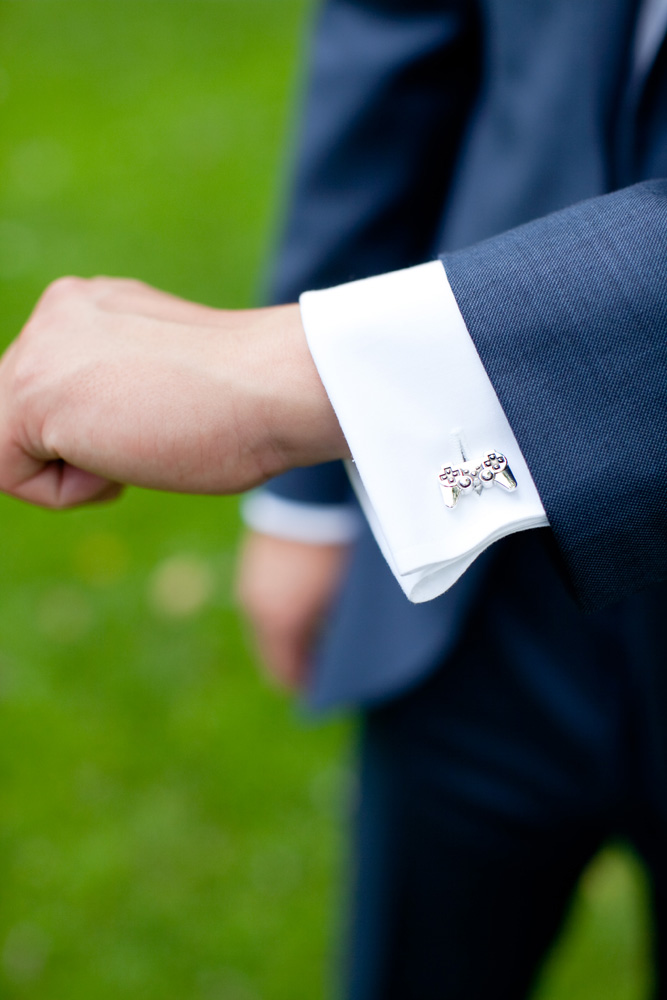 groom wearing xbox cufflinks