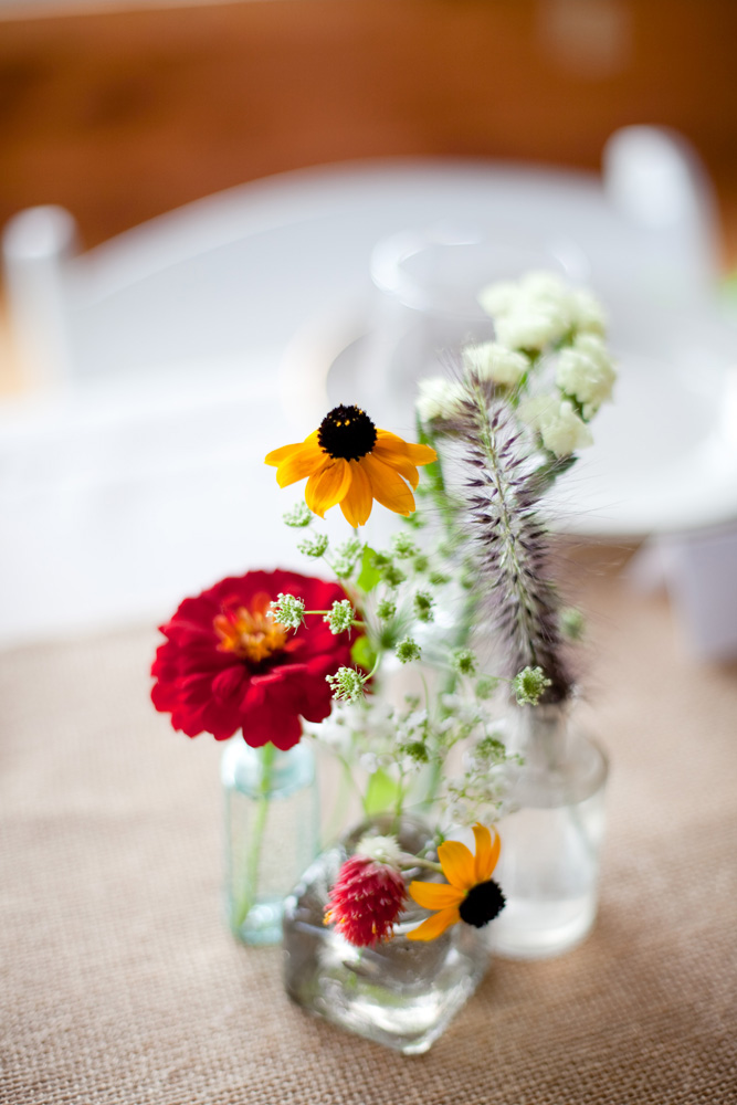 diy floral arrangements at rustic wedding