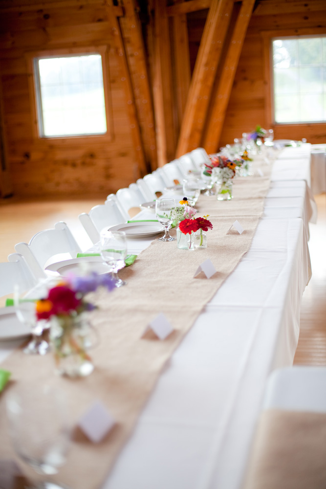 simple diy floral arrangements at barn wedding